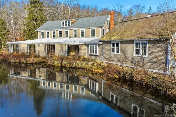 a front view of a house with swimming pool