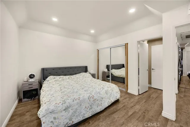 a room with a bed and a window