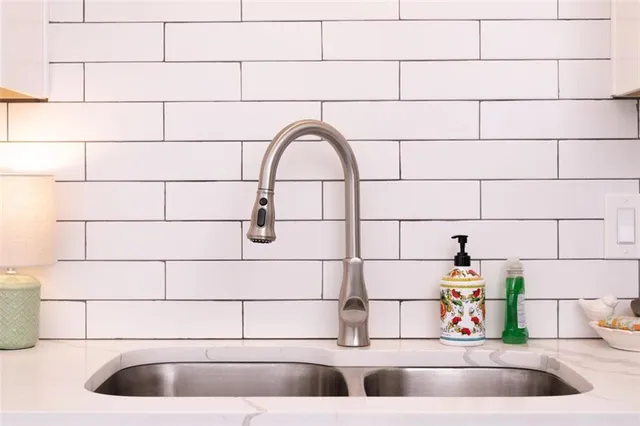 a close view of sink and mirror