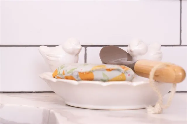 a white bath tub sitting in a bathroom