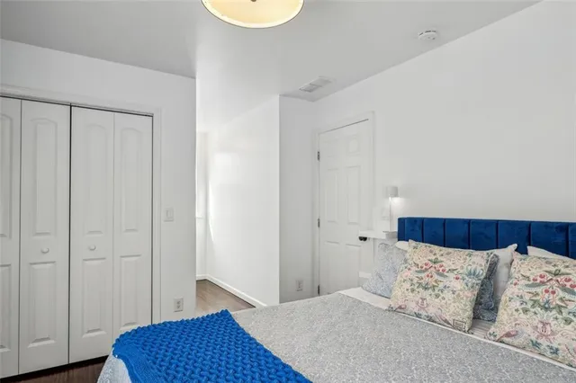 a kitchen with a sink and a chandelier