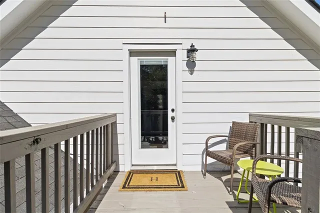 a view of a porch with furniture
