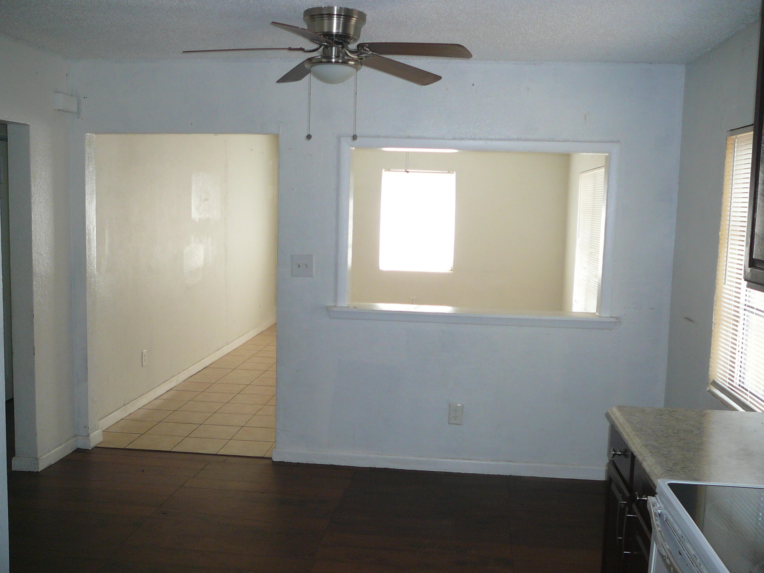 512 South 25th Street Fort Pierce, FL 34950 - Photo 10 of 17 a view of an empty room with a window