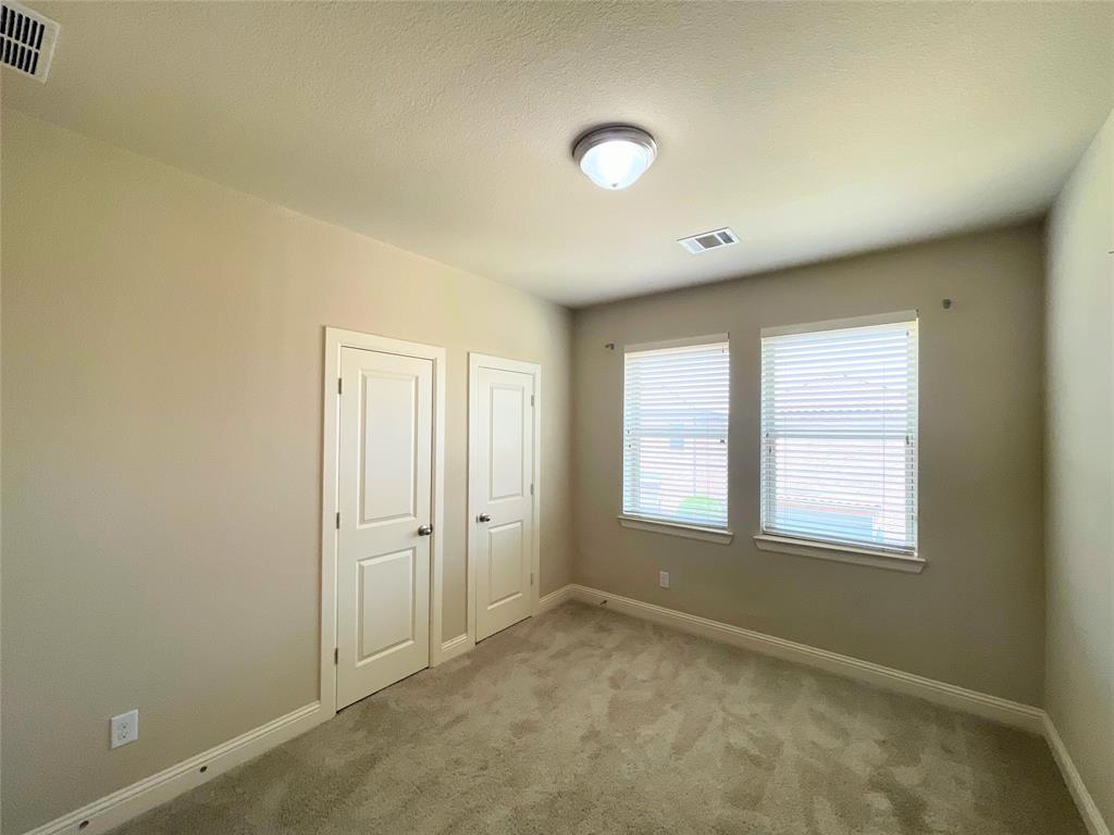 6622 DeLeon Street Irving, TX 75039 - Photo 23 of 32 an empty room with windows