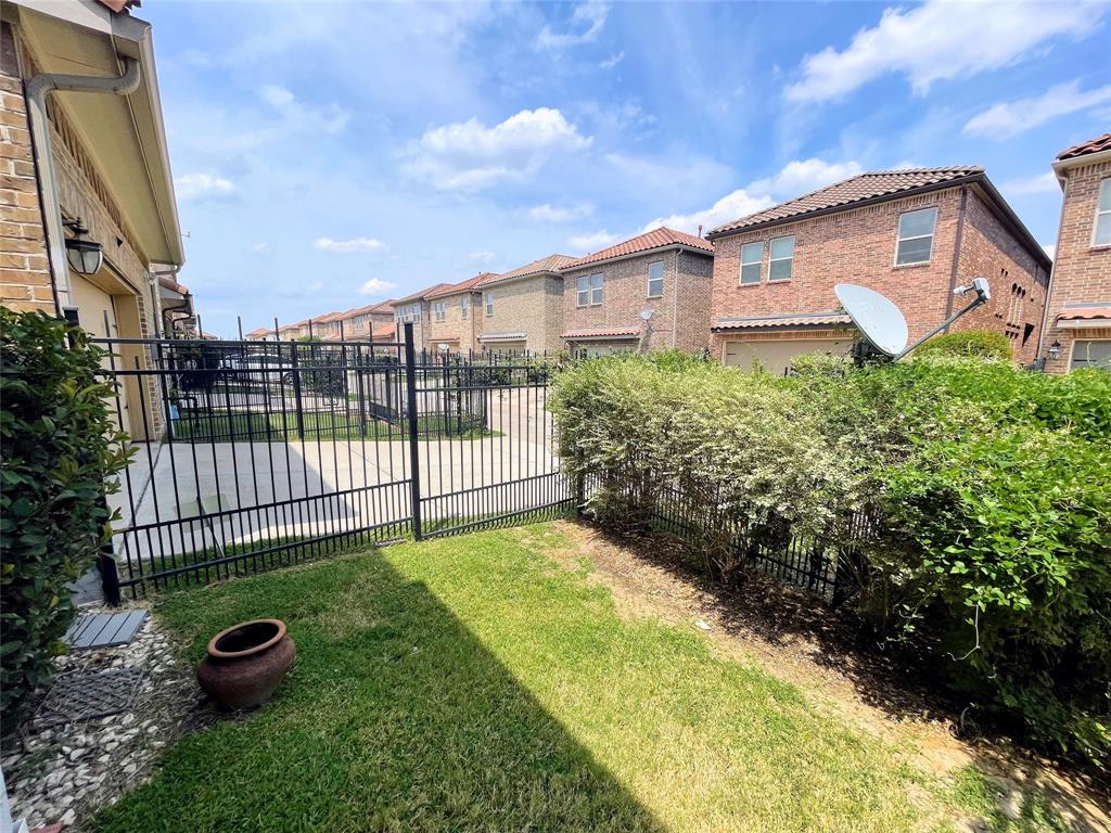 6622 DeLeon Street Irving, TX 75039 - Photo 28 of 32 a view of a house with a yard and plants