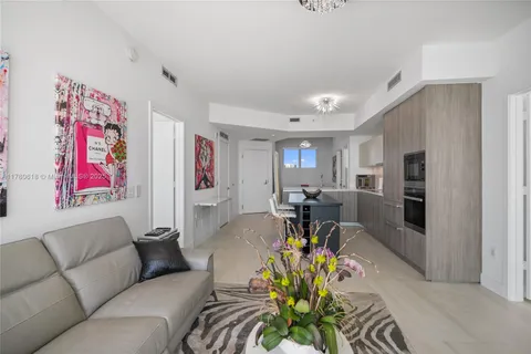 a bathroom with a sink double vanity and a shower