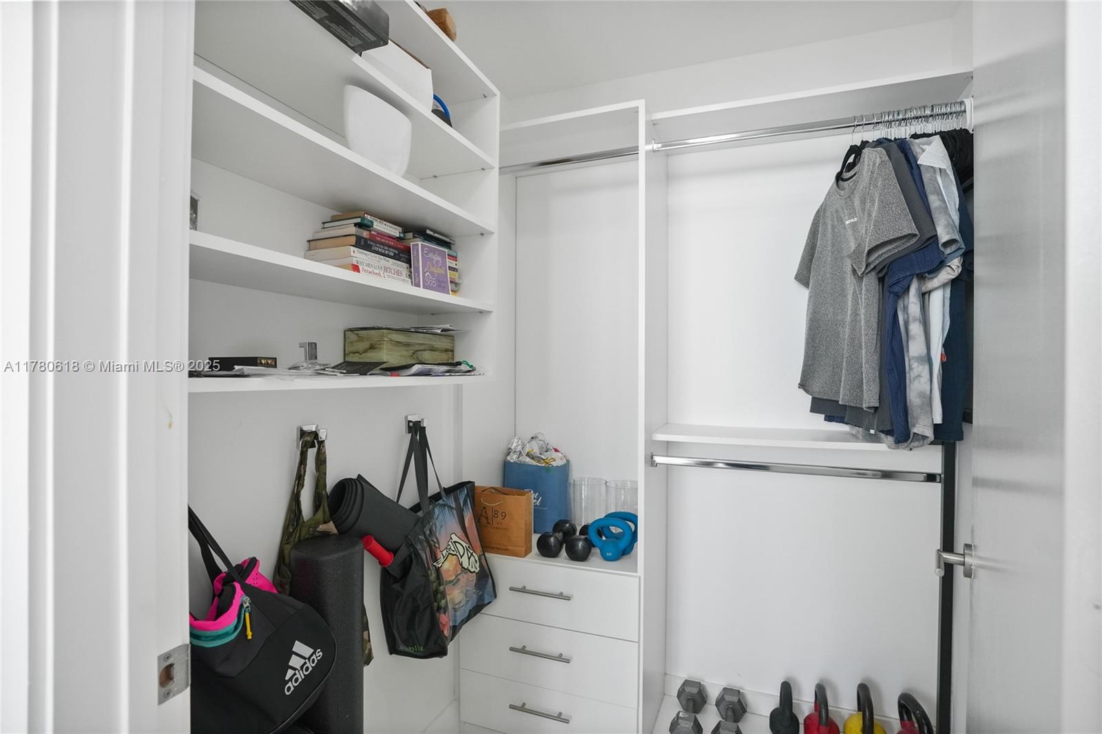 2900 Northeast 7th Avenue, Unit 1905 Miami, FL 33137 - Photo 36 of 82 a view of walk in closet with clothes and shoes