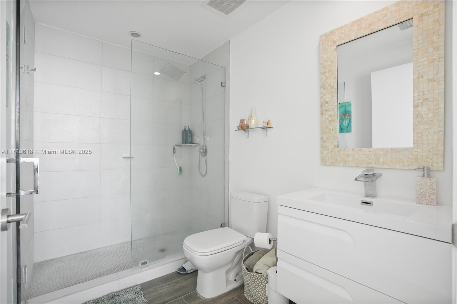 2900 Northeast 7th Avenue, Unit 1905 Miami, FL 33137 - Photo 37 of 82 a bathroom with a sink toilet and shower