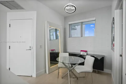 a bathroom with a shower and a sink