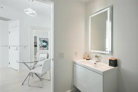 a view of a living room and a microwave