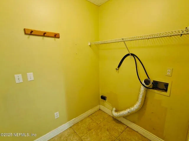 a view of a wall with a mirror