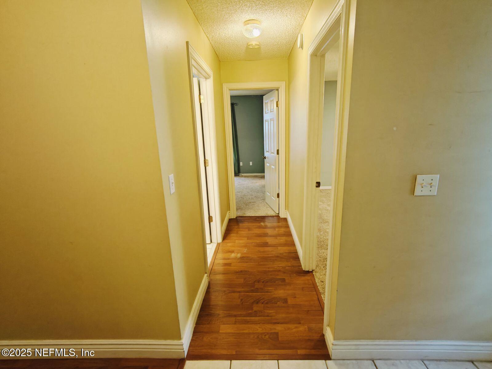 1845 Weston Circle Fleming Island, FL 32003 - Photo 25 of 36 a view of a bathroom with a door