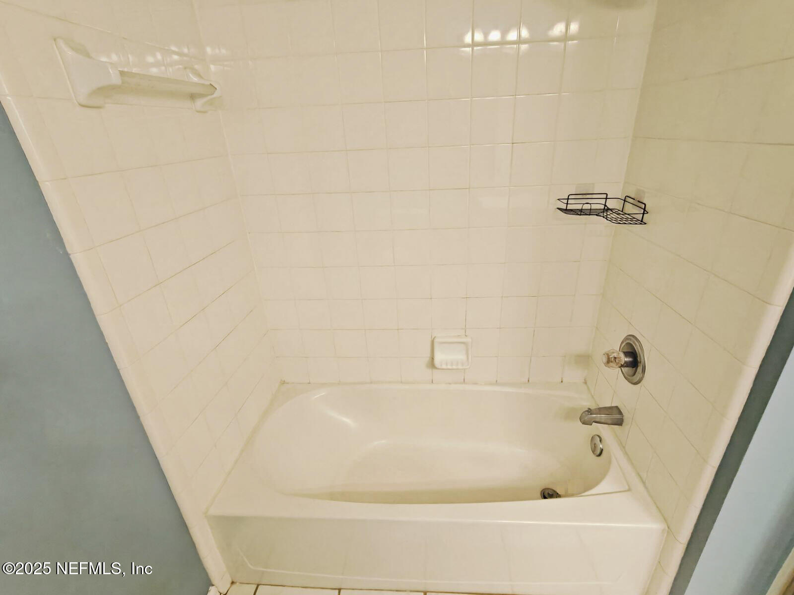 1845 Weston Circle Fleming Island, FL 32003 - Photo 28 of 36 a bathroom with a bathtub