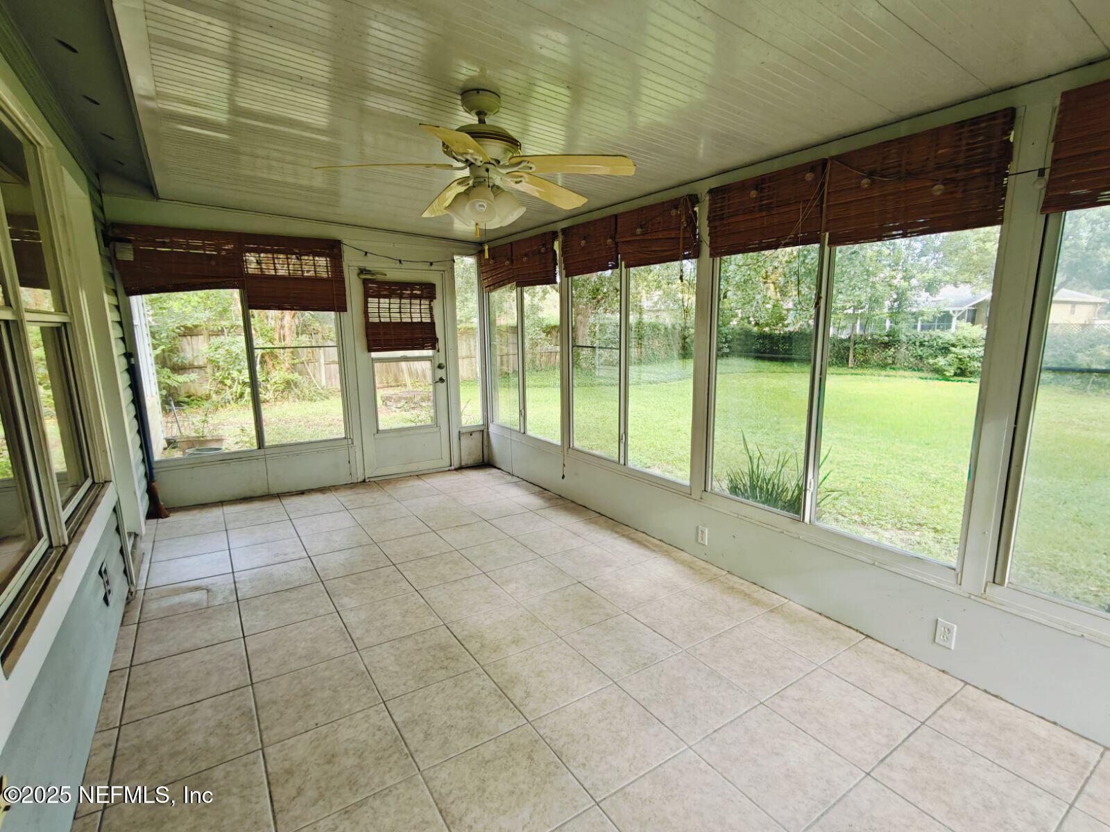 1845 Weston Circle Fleming Island, FL 32003 - Photo 32 of 36 a view of an empty room with a window