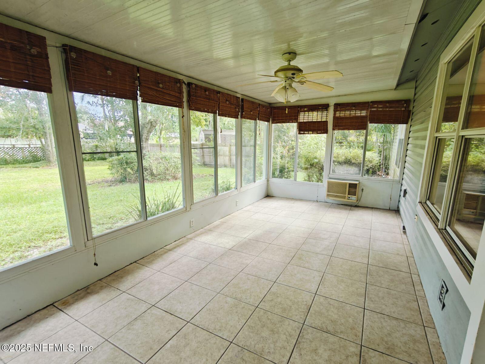 1845 Weston Circle Fleming Island, FL 32003 - Photo 33 of 36 a view of an empty room with a window