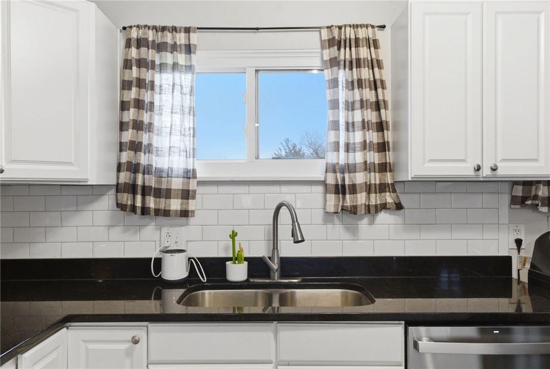 441 Townsend Place Riverside, OH 45431 - Photo 13 of 34 This bright kitchen offers functional design with a double basin sink and ample cabinetry.