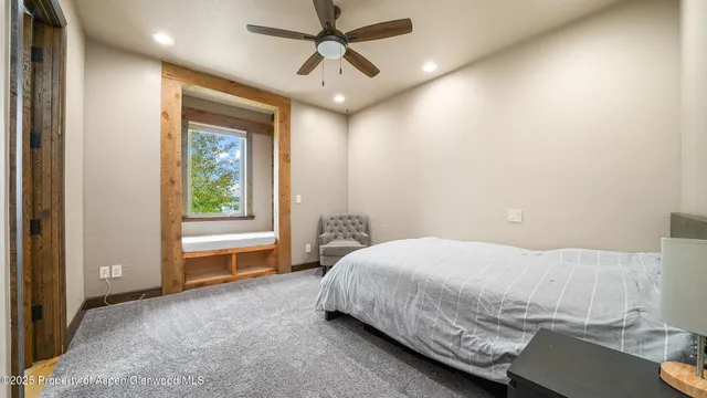 a bathroom with a granite countertop sink a mirror and a