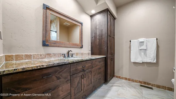 a utility room with window dryer and washer