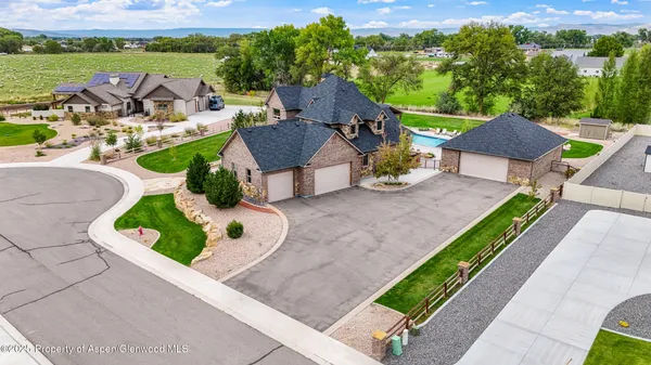 an aerial view of an outdoor space and city view