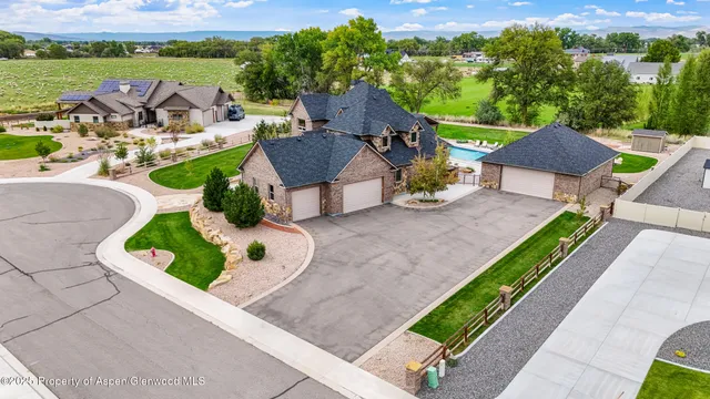 an aerial view of an outdoor space and city view