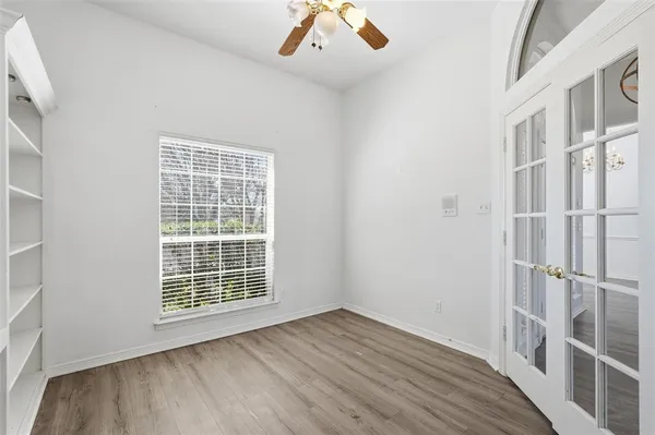 an empty room with windows