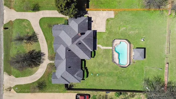 an aerial view of a swimming pool