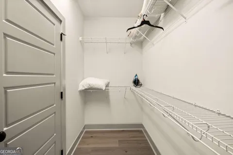 a view of a patio with a table chairs and a backyard