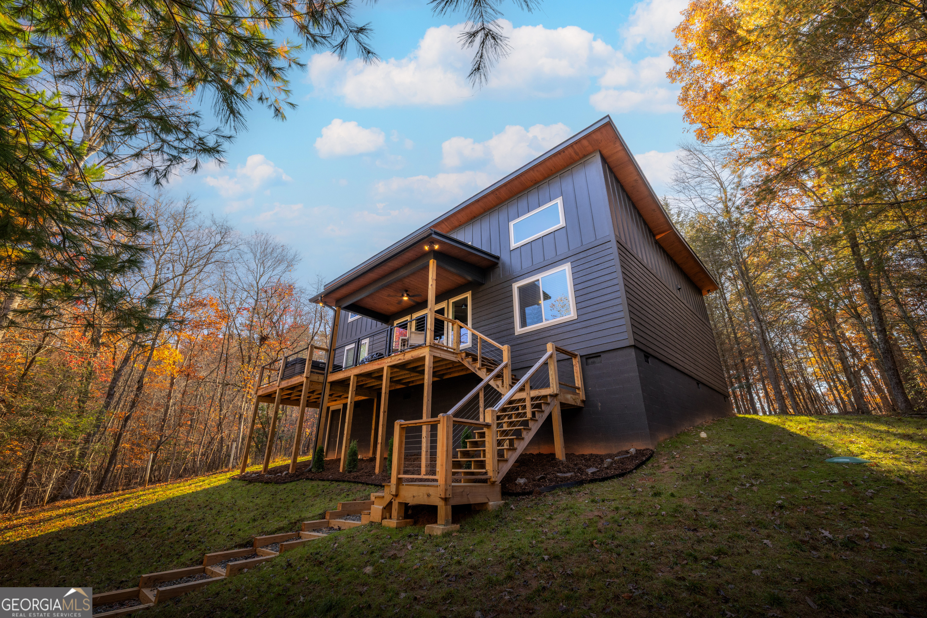 1421 Kelly Ridge Drive, Unit 28 Blue Ridge, GA 30513 - Photo 31 of 39 a view of a house with a yard