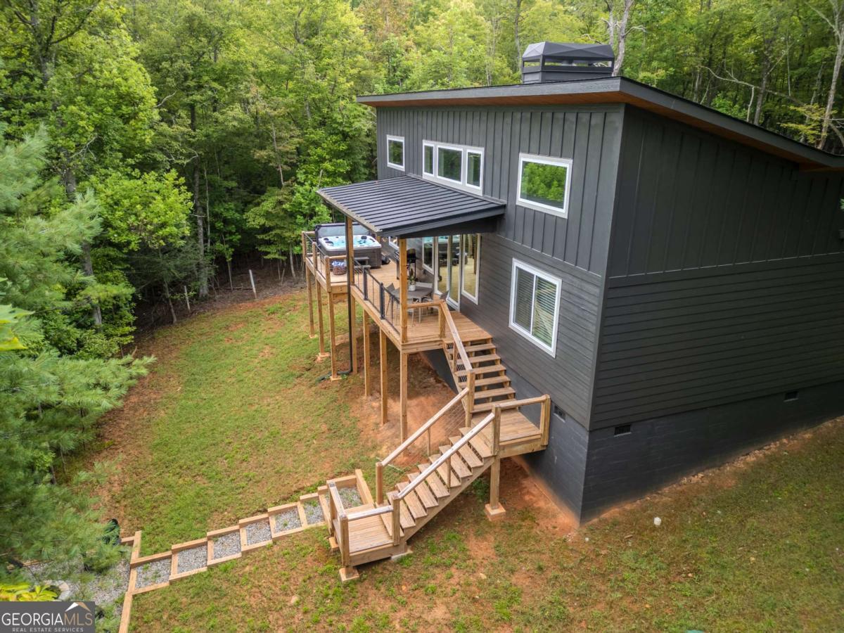 1421 Kelly Ridge Drive, Unit 28 Blue Ridge, GA 30513 - Photo 32 of 39 a view of a house with pool