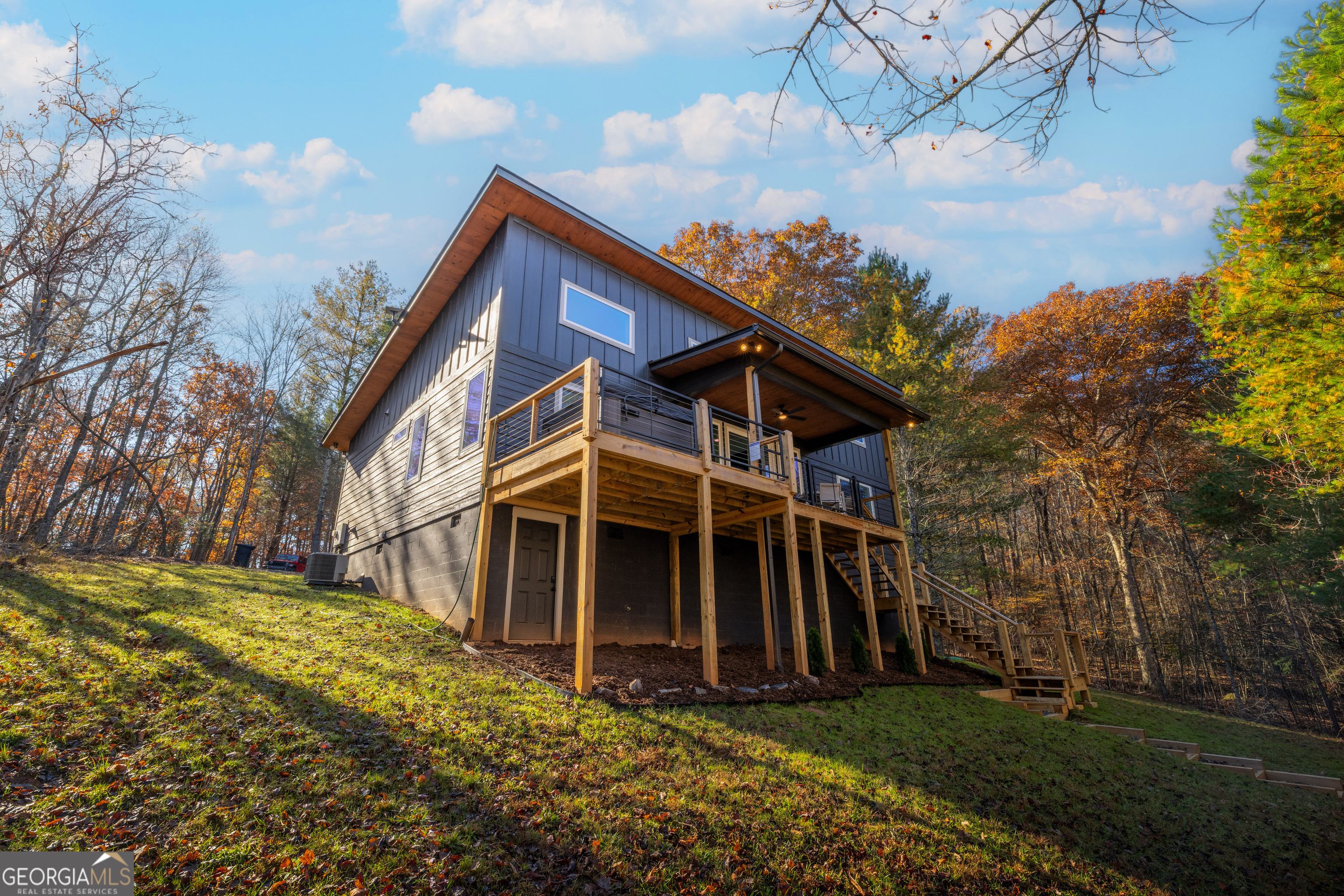 1421 Kelly Ridge Drive, Unit 28 Blue Ridge, GA 30513 - Photo 37 of 39 a view of a house with a yard