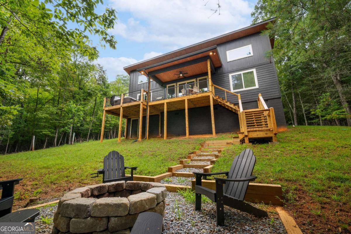 1421 Kelly Ridge Drive, Unit 28 Blue Ridge, GA 30513 - Photo 4 of 39 a front view of a house with garden