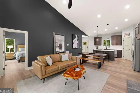 a living room with furniture and a table