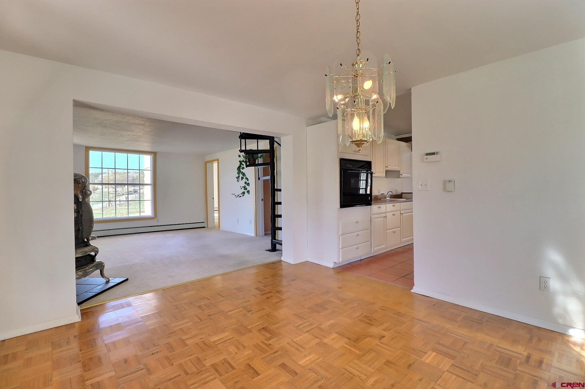 39599 Pitkin Road Paonia, CO 81428 - Photo 17 of 43 a view of a livingroom with a chandelier