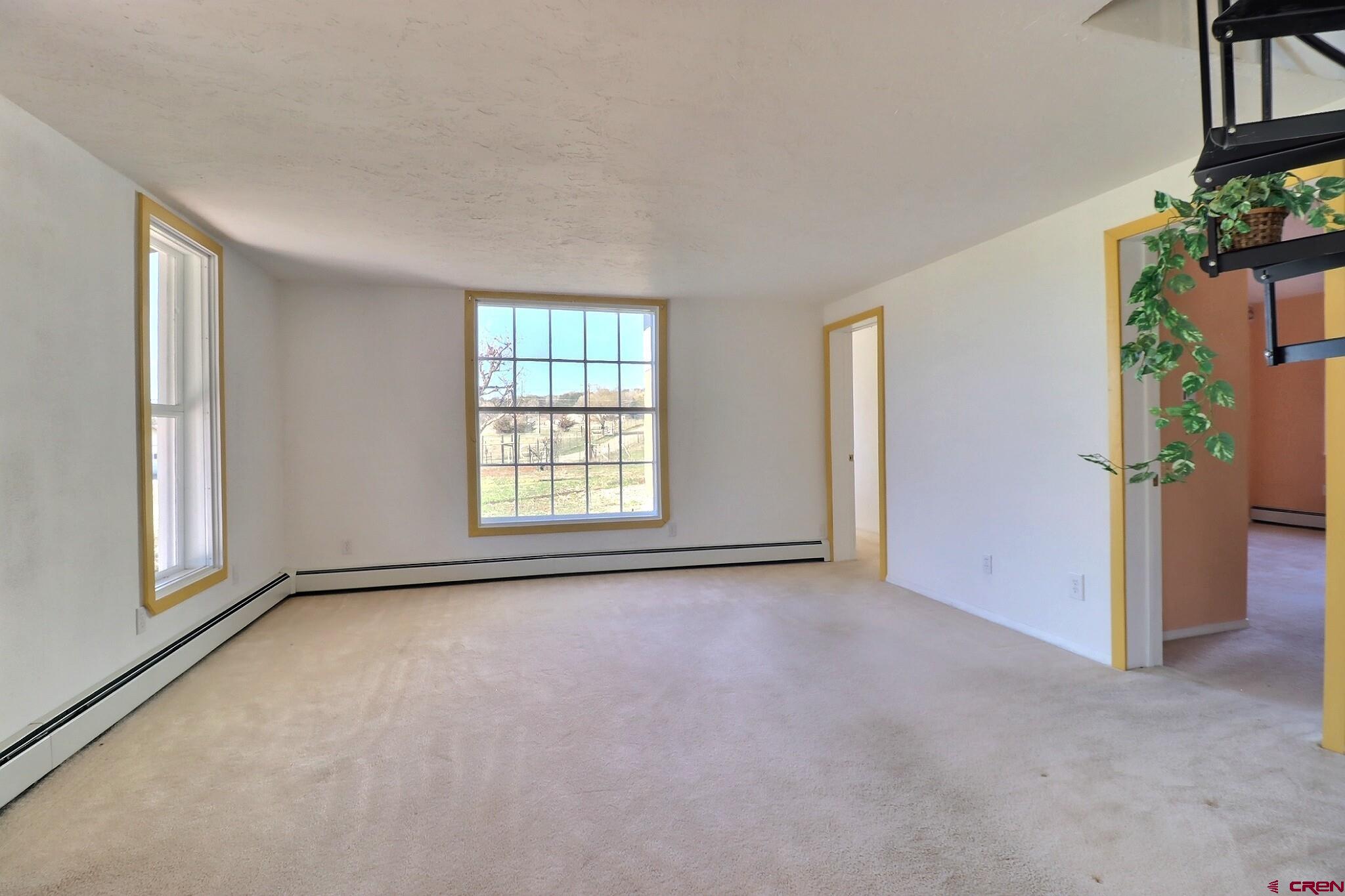 39599 Pitkin Road Paonia, CO 81428 - Photo 18 of 43 an empty room with windows