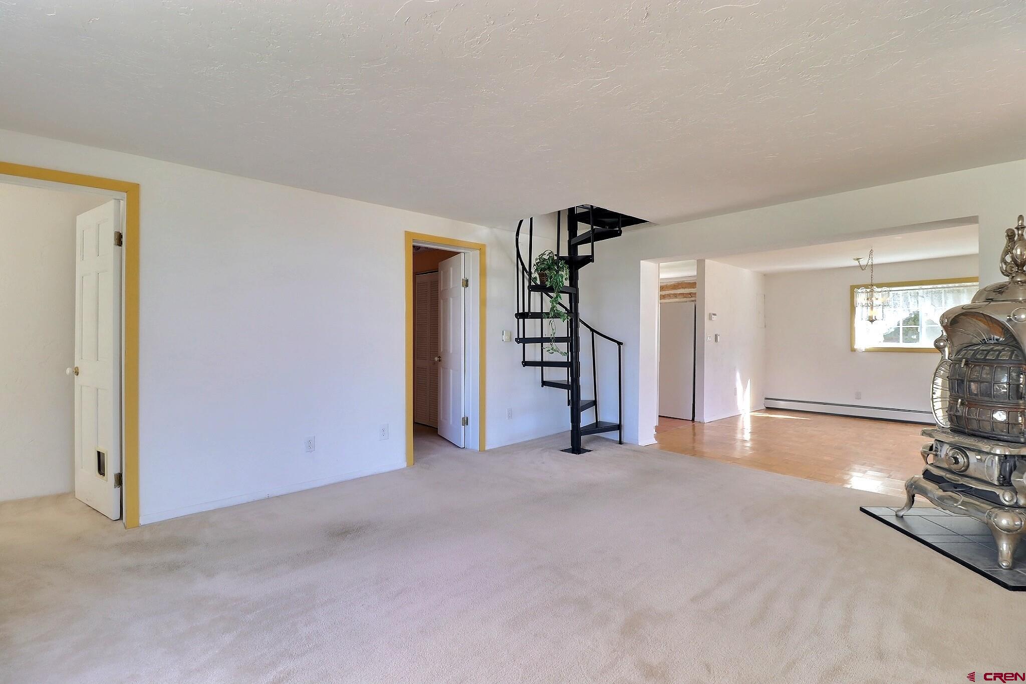 39599 Pitkin Road Paonia, CO 81428 - Photo 19 of 43 a view of a livingroom with a staircase
