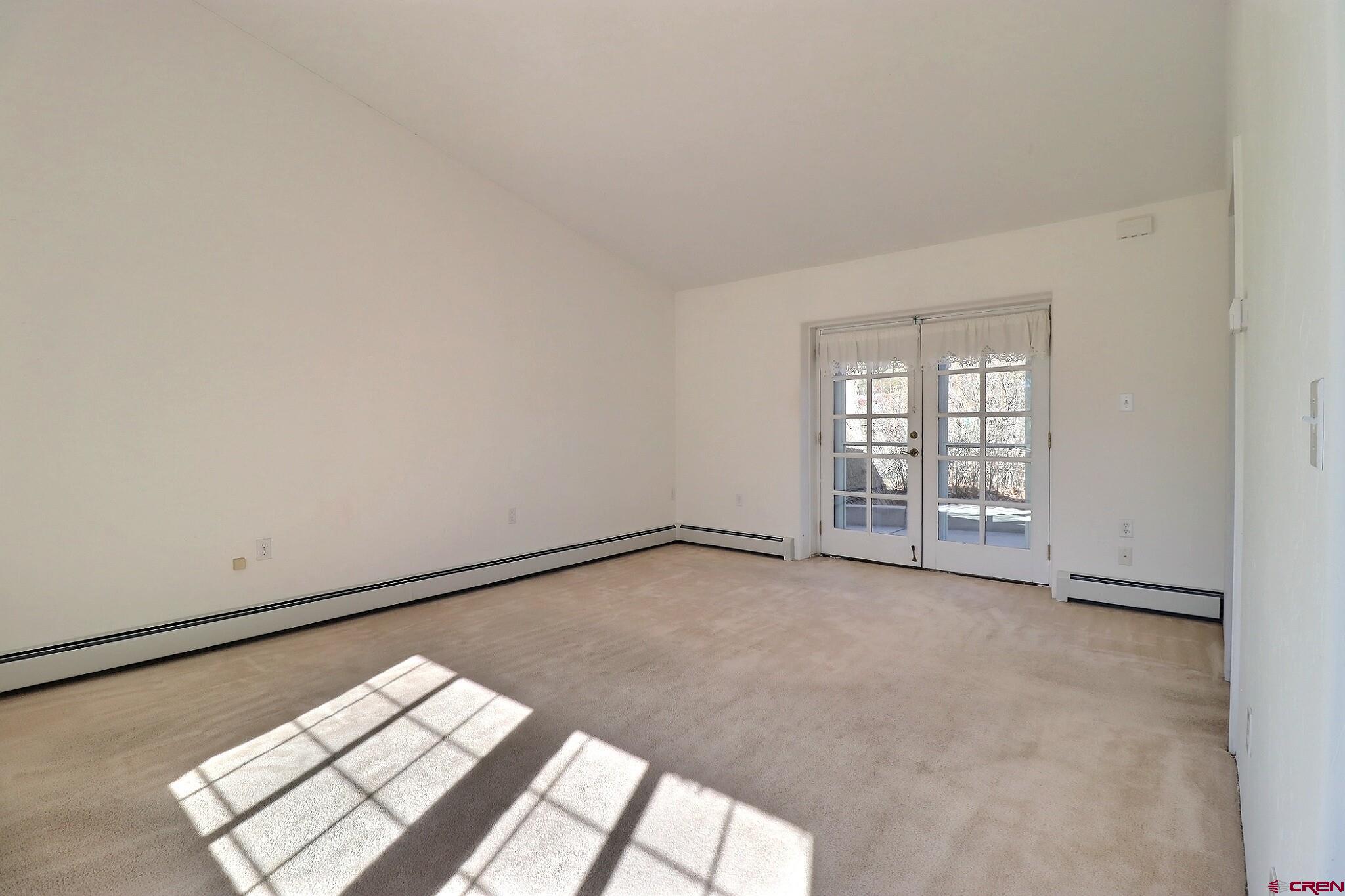 39599 Pitkin Road Paonia, CO 81428 - Photo 21 of 43 an empty room with windows