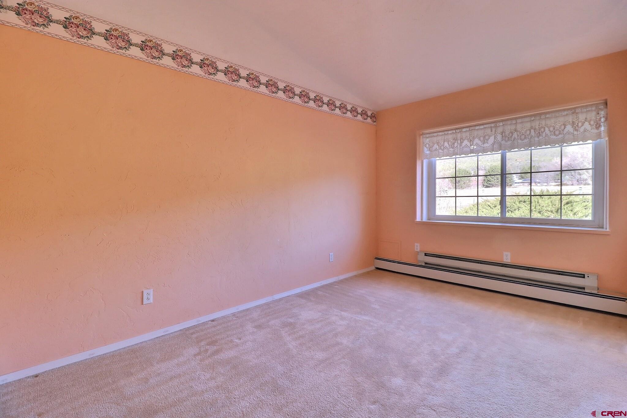 39599 Pitkin Road Paonia, CO 81428 - Photo 26 of 43 an empty room with windows