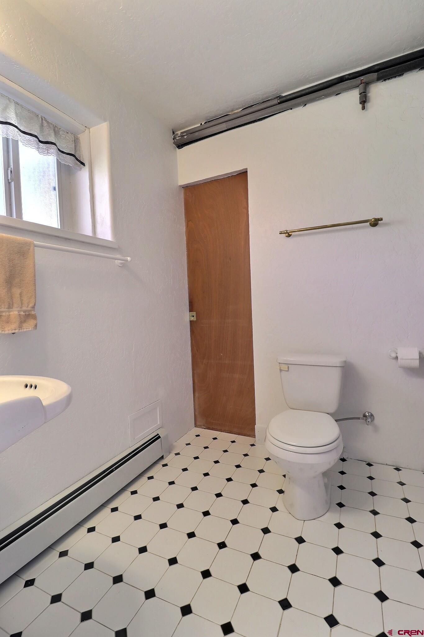 39599 Pitkin Road Paonia, CO 81428 - Photo 29 of 43 a bathroom with a toilet and a shower