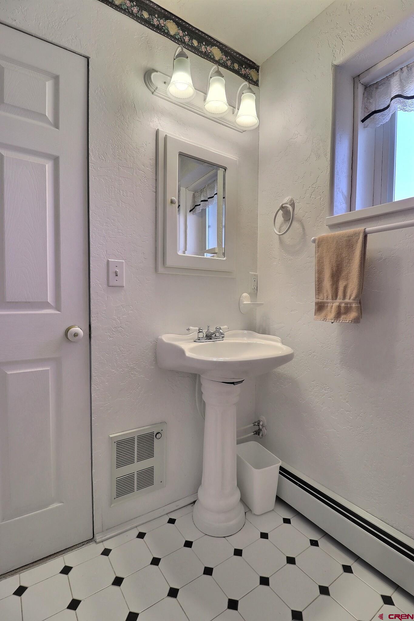 39599 Pitkin Road Paonia, CO 81428 - Photo 31 of 43 a bathroom with a sink toilet and shower