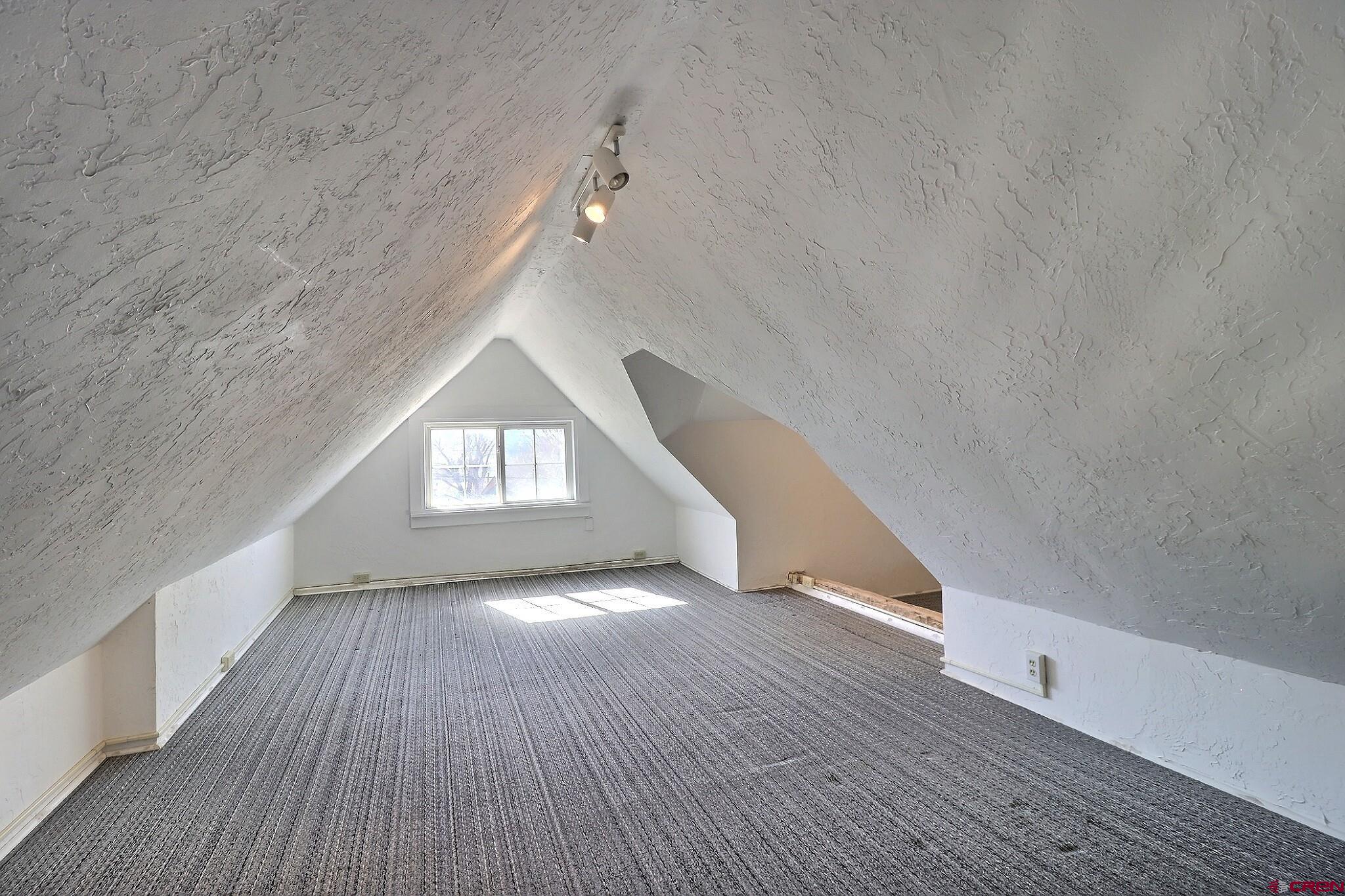 39599 Pitkin Road Paonia, CO 81428 - Photo 34 of 43 a view of an empty room and wooden floor