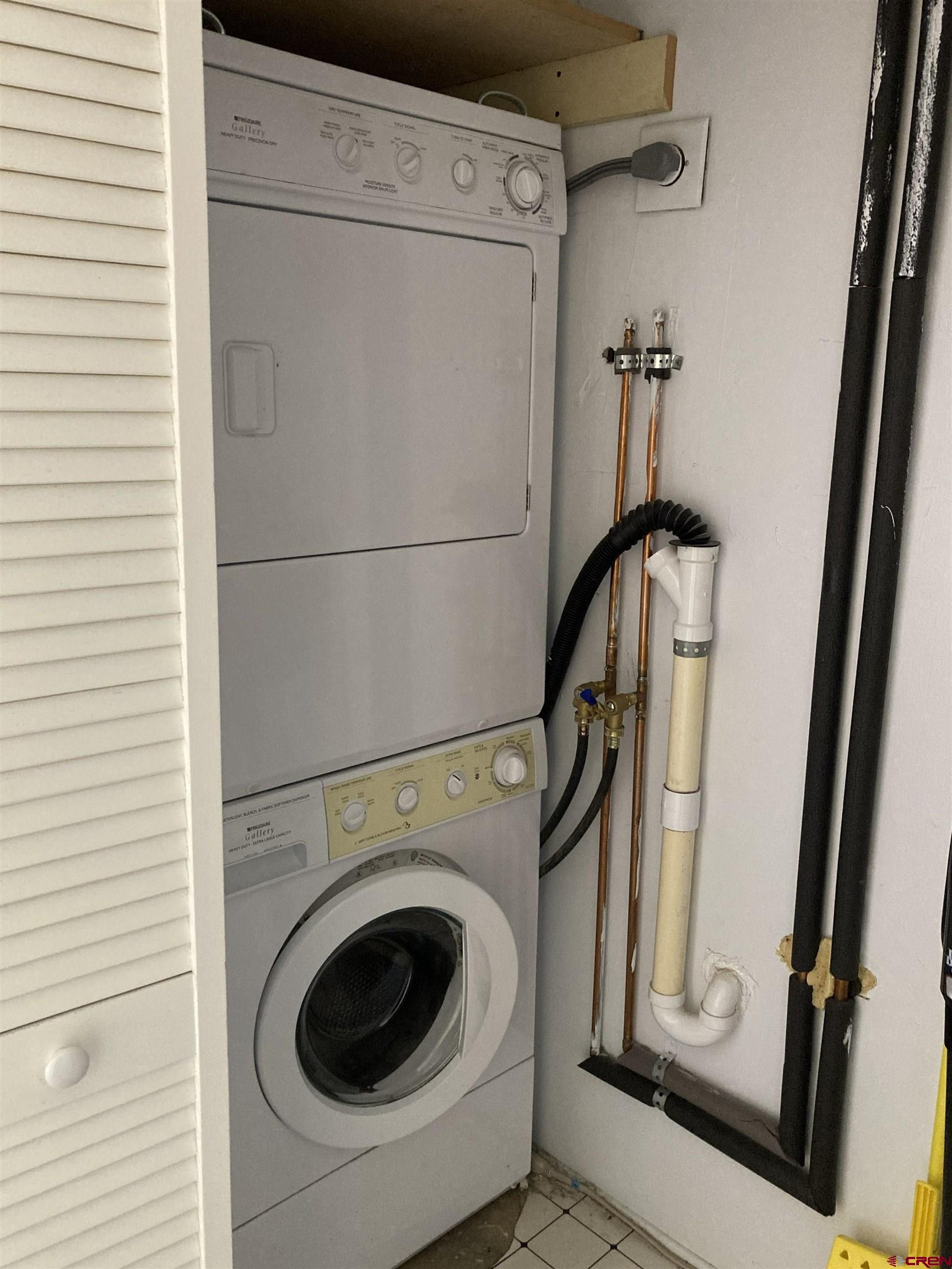 39599 Pitkin Road Paonia, CO 81428 - Photo 35 of 43 a utility room with dryer and washer