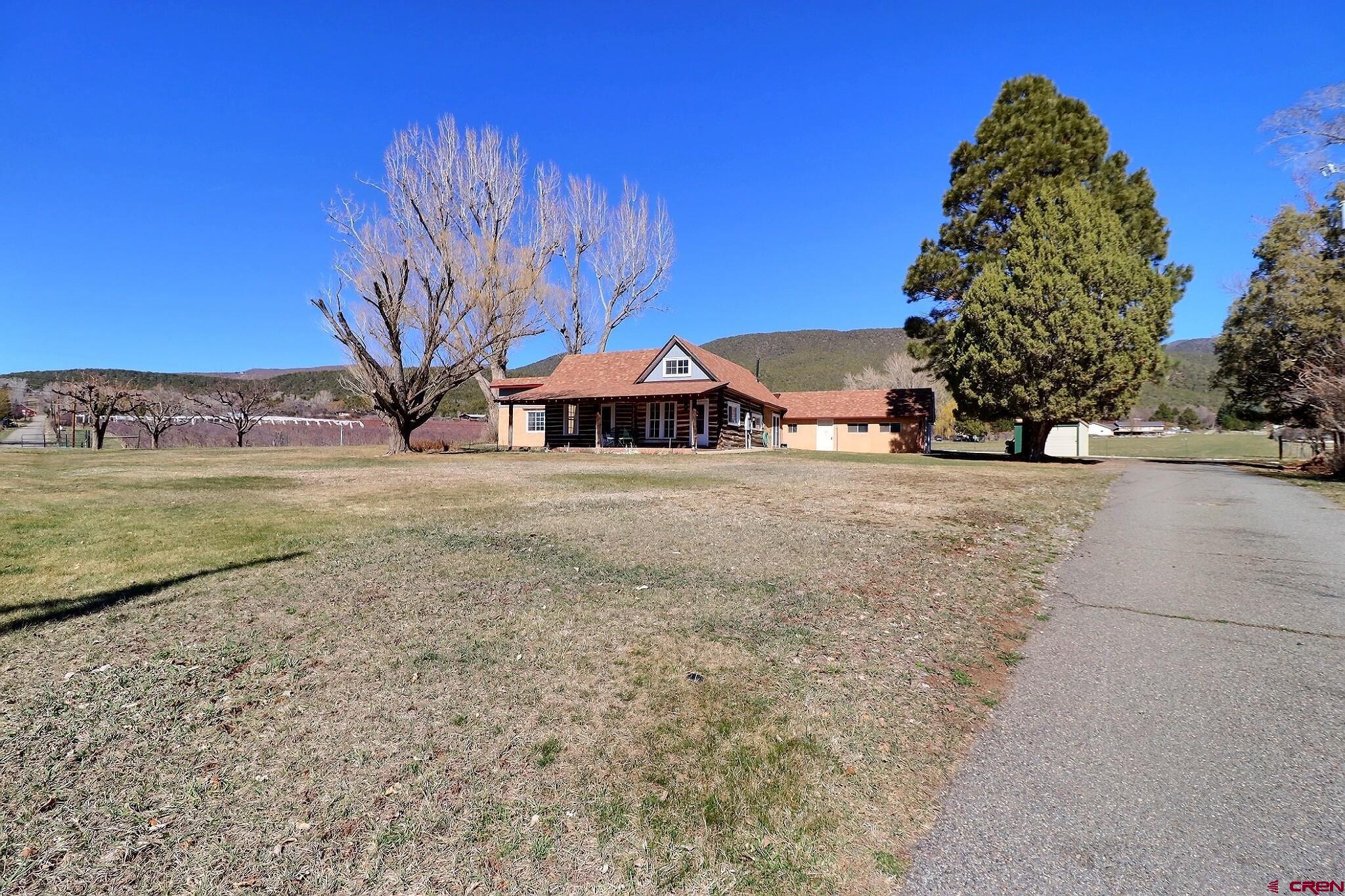 39599 Pitkin Road Paonia, CO 81428 - Photo 39 of 43 a view of a house with a yard and garage