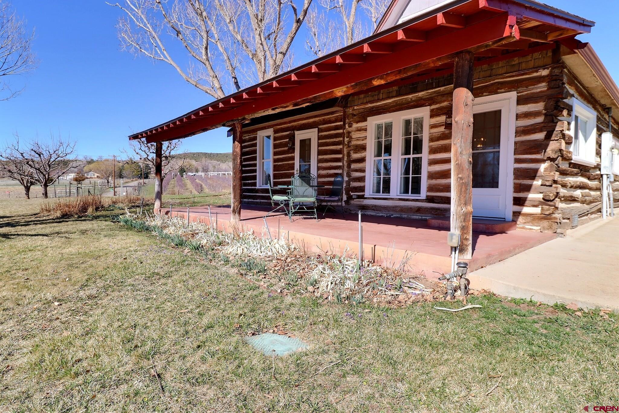 39599 Pitkin Road Paonia, CO 81428 - Photo 4 of 43 front view of a house with a yard