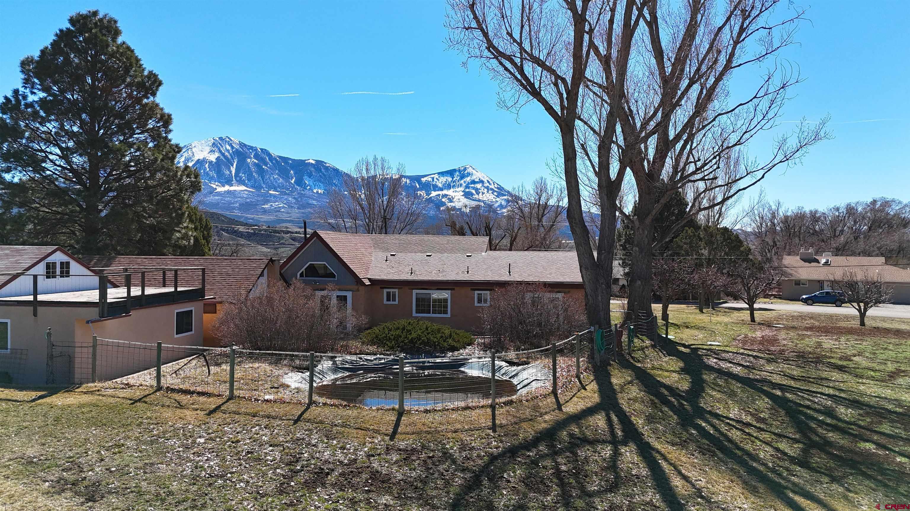 39599 Pitkin Road Paonia, CO 81428 - Photo 41 of 43 a view of a house with a yard and sitting area