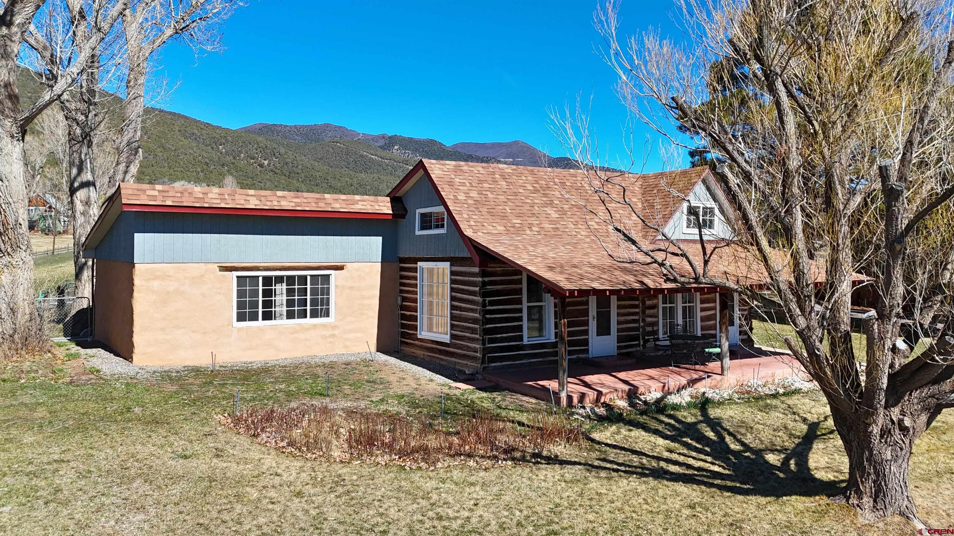 39599 Pitkin Road Paonia, CO 81428 - Photo 6 of 43 a view of a house with a yard