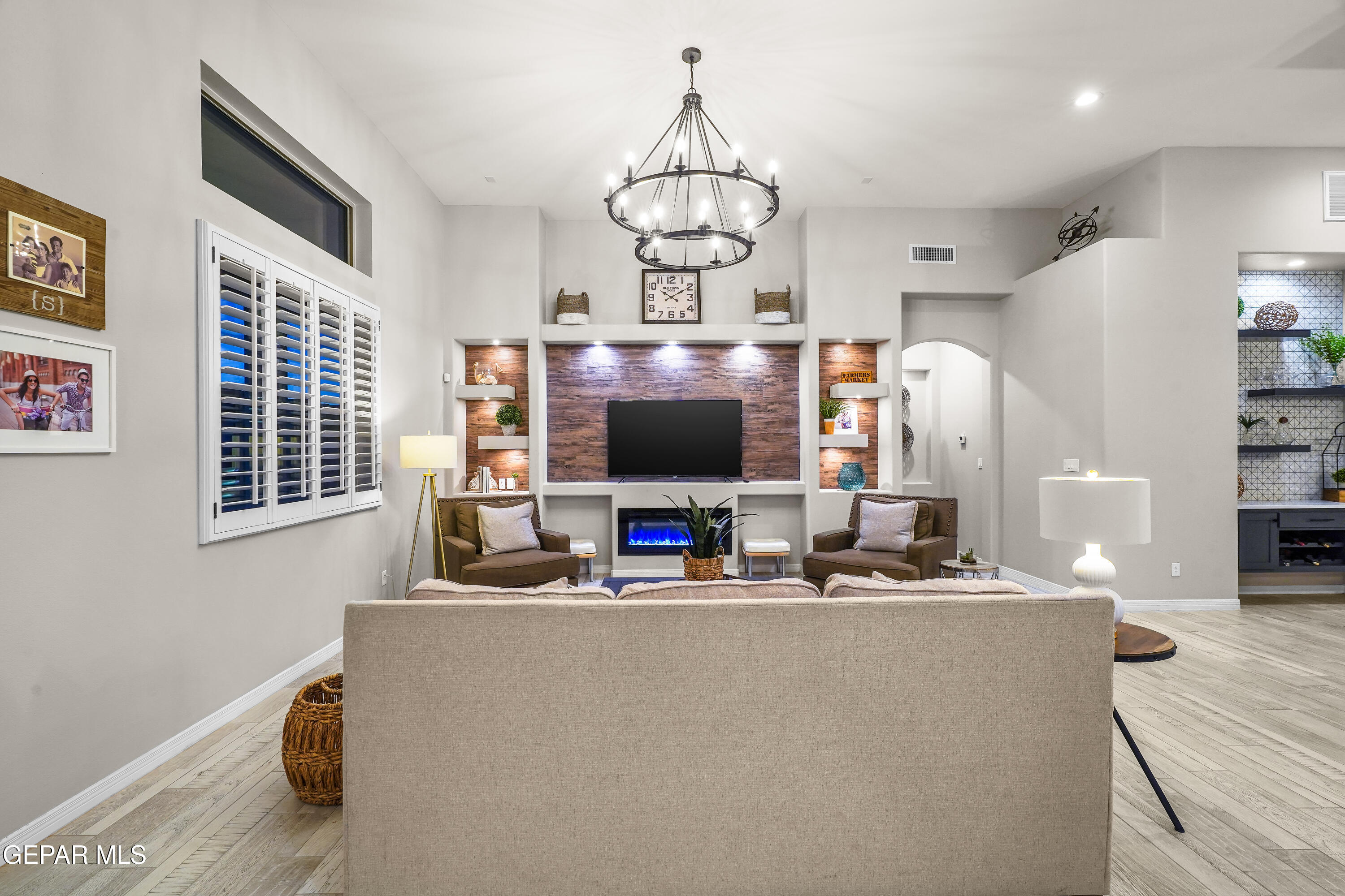 320 Emerald Rise Drive El Paso, TX 79928 - Photo 12 of 29 a living room with fireplace furniture and a flat screen tv