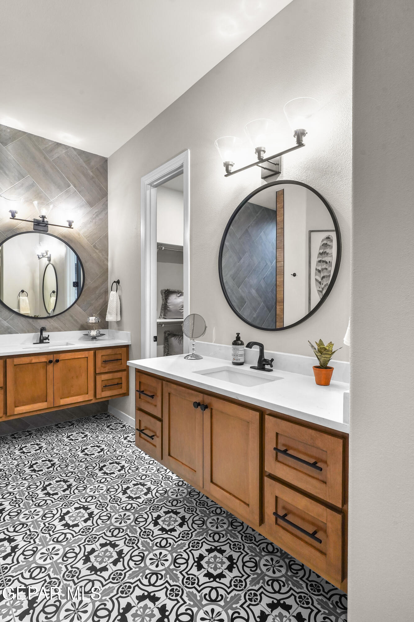 320 Emerald Rise Drive El Paso, TX 79928 - Photo 18 of 29 a bathroom with a sink and a mirror