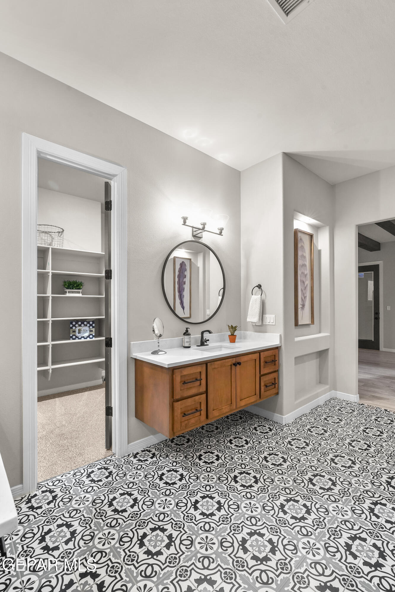 320 Emerald Rise Drive El Paso, TX 79928 - Photo 25 of 29 a room with a bed and cabinets