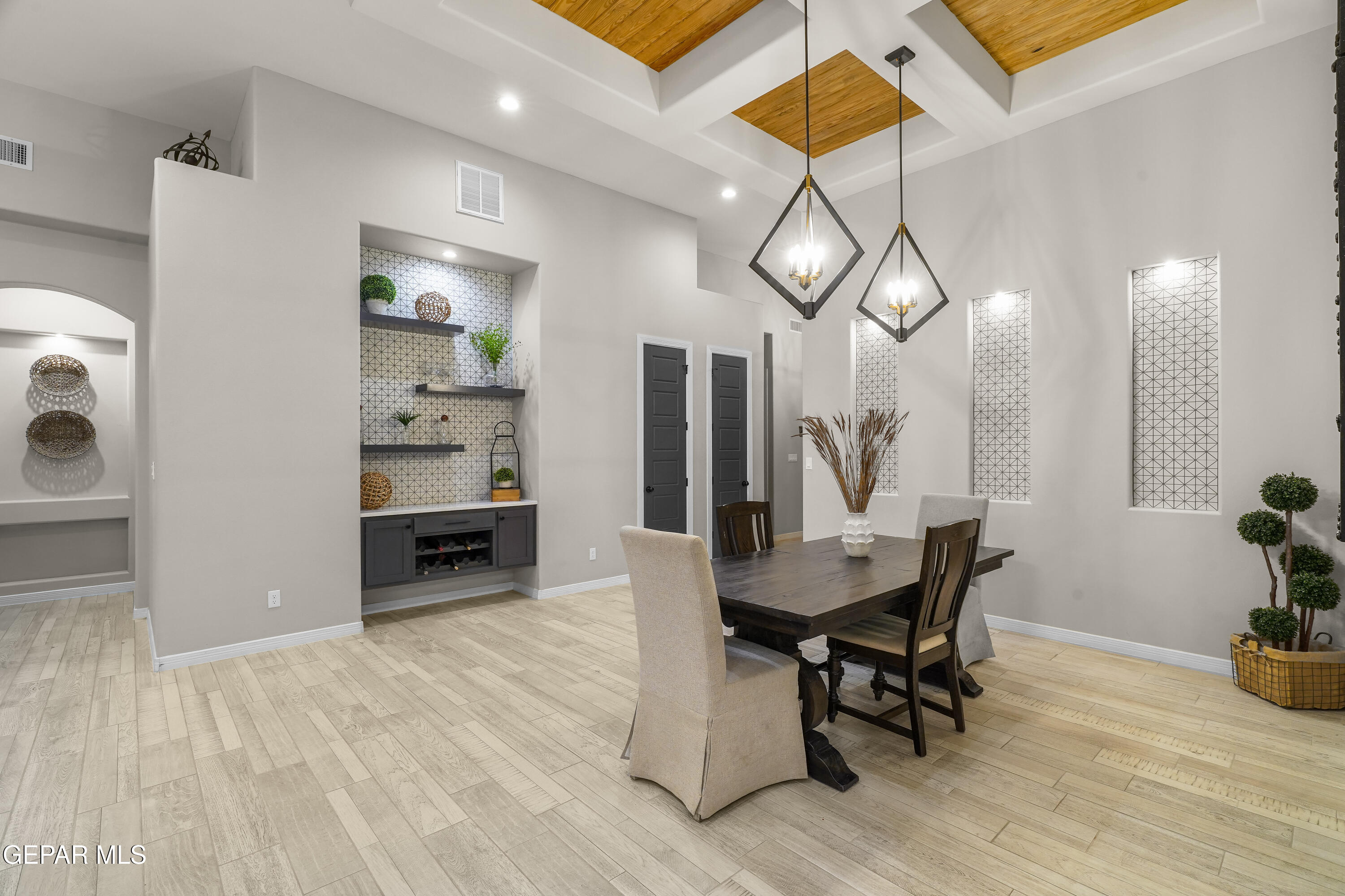 320 Emerald Rise Drive El Paso, TX 79928 - Photo 6 of 29 a view of a dining room with furniture and wooden floor