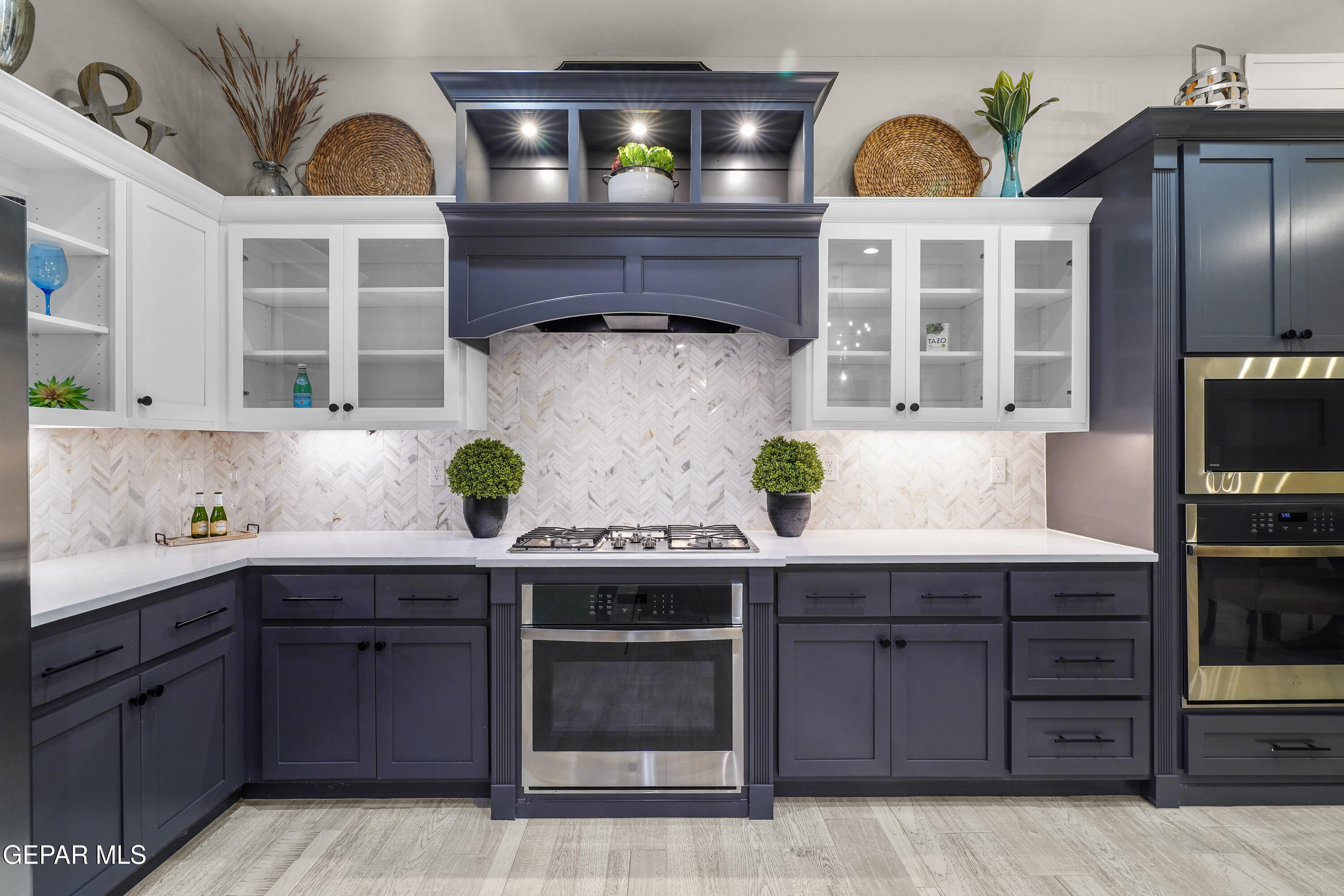320 Emerald Rise Drive El Paso, TX 79928 - Photo 7 of 29 a kitchen with a sink and cabinets